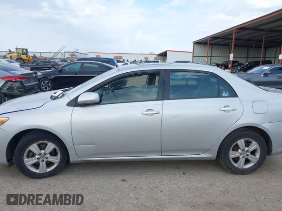 2011 Toyota Corolla L with VIN 2T1BU4EEXBC571707, listed as a IAAI auction lot 41884755 with 200,210 mi miles. Bid and sale history available at carsss.com. Image 14.