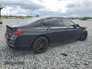 2021 BMW 7 Series 740i with VIN WBA7T2C01MCF78660, listed as a Copart auction lot 59582205 with 51,868 mi miles and Salvage title. Bid and sale history available at DreamBid. Image 3.