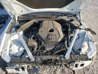 2023 Genesis G70 2.0T with VIN KMTG34TA3PU105184, listed as a Copart auction lot 77366344 with 36,582 mi miles and Salvage Title. Bid and sale history available at carsss.com. Image 12.