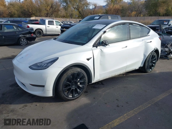 2021 Tesla Model Y Long Range with VIN 5YJYGDEE3MF098586, listed as a IAAI auction lot 40939802 with Not Provided miles and . Bid and sale history available at DreamBid. Image 16.