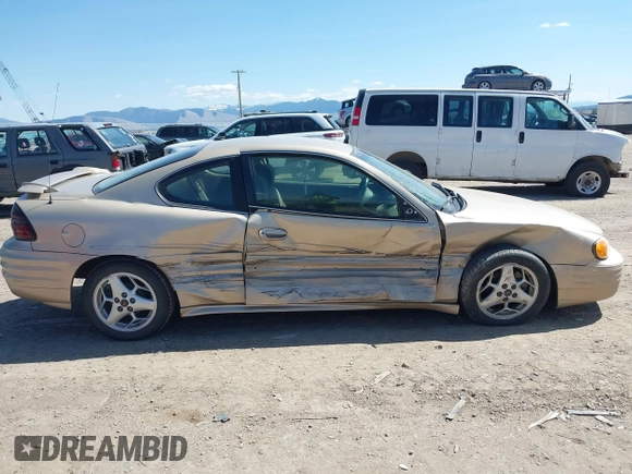 2001 Pontiac Grand Am z VIN 1G2NF12T51M534918, wystawiony jako IAAI lot #42055289 z przebiegiem 128 155 mil mil oraz . Historia ofert i sprzedaży dostępna na DreamBid. Obrazek 14.