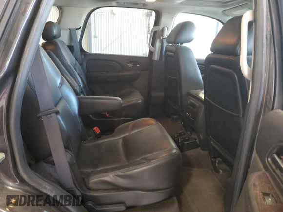 2010 GMC Yukon Denali z VIN 1GKUKEEFXAR179946, wystawiony jako Copart lot #57218255 z przebiegiem 155 971 mil mil oraz Czysty tytuł • Clean title. Historia ofert i sprzedaży dostępna na DreamBid. Obrazek 11.