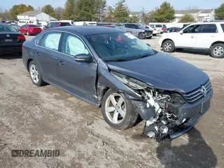 2013 Volkswagen Passat SE with VIN 1VWBP7A38DC006071, listed as a IAAI auction lot 41665237 with 87,640 mi miles and . Bid and sale history available at DreamBid. Image 1.