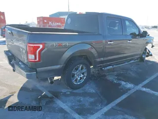 2015 Ford F-150 XLT with VIN 1FTEW1EG5FKF22006, listed as a IAAI auction lot 41637056 with 112,235 mi miles. Bid and sale history available at carsss.com. Image 4.