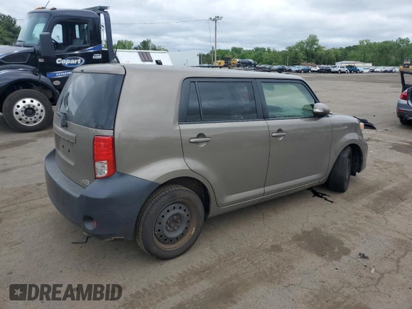 2012 Scion xB z VIN JTLZE4FE1CJ014494, wystawiony jako Copart lot #57779675 z przebiegiem 151 857 mil mil oraz Szkody całkowita. Historia ofert i sprzedaży dostępna na DreamBid. Obrazek 3.
