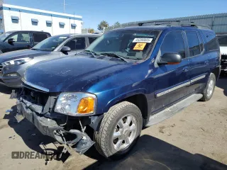 2003 GMC Envoy SLT z VIN 1GKET16S436169701, wystawiony jako Copart lot #44390805 z przebiegiem 168 236 mil mil oraz Szkody całkowita. Historia ofert i sprzedaży dostępna na DreamBid. Obrazek 1.