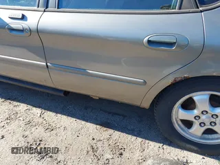 2004 Ford Taurus SE with VIN 1FAFP53224G197451, listed as a IAAI auction lot 41224109 with 290,224 mi miles and . Bid and sale history available at DreamBid. Image 6.