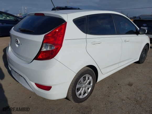 2014 Hyundai Accent GS with VIN KMHCT5AE8EU155466, listed as a IAAI auction lot 41905867 with 129,178 mi miles. Bid and sale history available at carsss.com. Image 4.