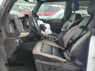 2024 Ford Bronco Wildtrak with VIN 1FMEE2BP9RLA07694, listed as a Copart auction lot 51856335 with 21,102 mi miles and Salvage title. Bid and sale history available at DreamBid. Image 7.