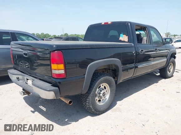 2003 GMC Sierra 1500HD SLE z VIN 1GTGK13U63F136146, wystawiony jako IAAI lot #42020608 z przebiegiem 170 466 mil mil oraz . Historia ofert i sprzedaży dostępna na DreamBid. Obrazek 4.