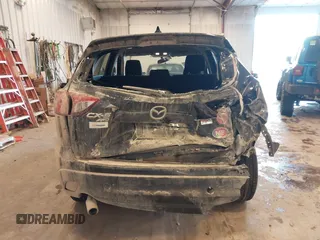 2015 Mazda CX-5 Sport with VIN JM3KE4BY0F0542655, listed as a IAAI auction lot 41471568 with 165,386 mi miles. Bid and sale history available at carsss.com. Image 16.