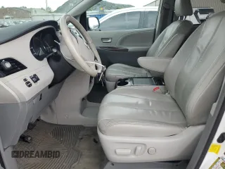 2012 Toyota Sienna XLE AAS with VIN 5TDYK3DC0CS212613, listed as a Copart auction lot 62317765 with 258,124 mi miles and Salvage title. Bid and sale history available at DreamBid. Image 7.