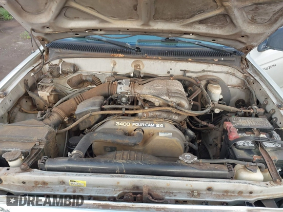2003 Toyota Tacoma PreRunner z VIN 5TEGN92N63Z170929, wystawiony jako IAAI lot #41778256 z przebiegiem 202 135 mil mil oraz . Historia ofert i sprzedaży dostępna na DreamBid. Obrazek 10.