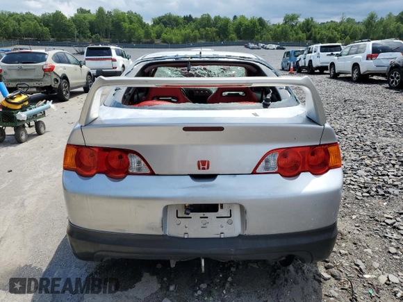 2002 Acura RSX Auto with VIN JH4DC54882C011723, listed as a Copart auction lot 64187865 with 106,692 mi miles and Clean title. Bid and sale history available at DreamBid. Image 6.