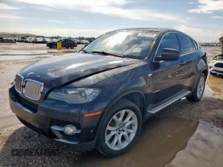 2012 BMW X6 50i z VIN 5UXFG8C51CL590643, wystawiony jako Copart lot #58493665 z przebiegiem 131 157 mil mil oraz Czysty tytuł • Clean title. Historia ofert i sprzedaży dostępna na DreamBid. Obrazek 1.