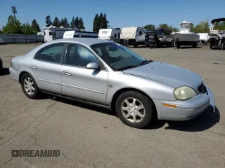 2003 Mercury Sable LS Premium with VIN 1MEHM55S53G606936, listed as a Copart auction lot 53159025 with 118,885 mi miles and Salvage Title. Bid and sale history available at DreamBid. Image 4.