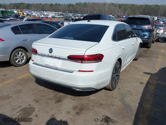 2021 Volkswagen Passat 2.0T SE with VIN 1VWSA7A39MC000409, listed as a IAAI auction lot 41804341 with 119,139 mi miles. Bid and sale history available at carsss.com. Image 4.