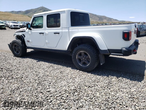 2022 Jeep Gladiator Rubicon z VIN 1C6JJTBG4NL135430, wystawiony jako Copart lot #52581015 z przebiegiem 54 553 mil mil oraz Szkoda całkowita • Salvage title. Historia ofert i sprzedaży dostępna na DreamBid. Obrazek 2.