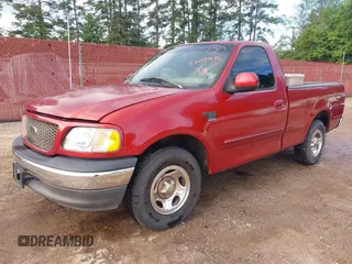 2002 Ford F-150 XL with VIN 1FTRF17W12NB34138, listed as a IAAI auction lot 42070485 with 115,798 mi miles. Bid and sale history available at carsss.com. Image 2.