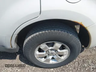 2010 Ford Escape Limited with VIN 1FMCU9EG8AKC42841, listed as a IAAI auction lot 42492355 with 159,939 mi miles and . Bid and sale history available at DreamBid. Image 16.