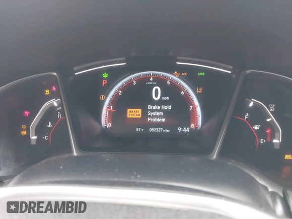 2021 Honda Civic Sport with VIN 2HGFC2F87MH554620, listed as a IAAI auction lot 41743596 with 52,327 mi miles and . Bid and sale history available at DreamBid. Image 7.