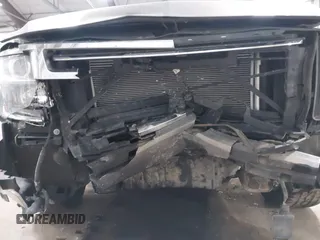2018 Chevrolet Suburban Premier z VIN 1GNSKJKC9JR100134, wystawiony jako IAAI lot #41449255 z przebiegiem 111 528 mil mil oraz . Historia ofert i sprzedaży dostępna na DreamBid. Obrazek 6.