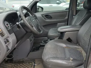 2002 Ford Escape XLS Choice with VIN 1FMYU02102KB67376, listed as a Copart auction lot 79109394 with 234,306 mi miles and Salvage title. Bid and sale history available at DreamBid. Image 7.
