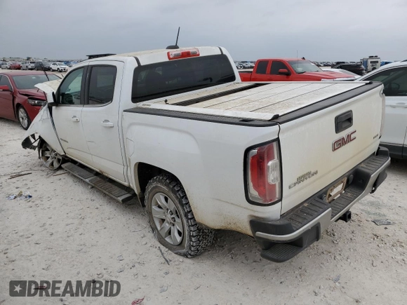 2015 GMC Canyon 2WD SLE with VIN 1GTG5BE31F1227070, listed as a Copart auction lot 51337865 with 49,394 mi miles and Salvage Title. Bid and sale history available at DreamBid. Image 2.