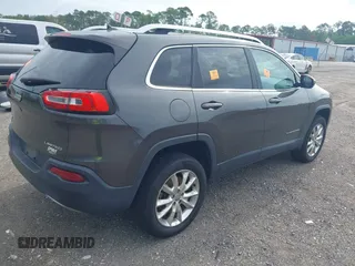 2014 Jeep Cherokee Limited z VIN 1C4PJMDSXEW294199, wystawiony jako IAAI lot #42466782 z przebiegiem 137 783 mil mil oraz . Historia ofert i sprzedaży dostępna na DreamBid. Obrazek 4.