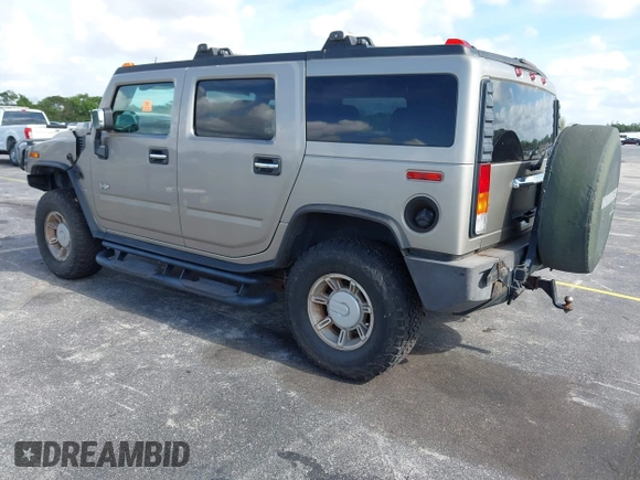 2003 Hummer H2 z VIN 5GRGN23U63H131139, wystawiony jako IAAI lot #42540561 z przebiegiem 182 365 mil mil oraz . Historia ofert i sprzedaży dostępna na DreamBid. Obrazek 3.