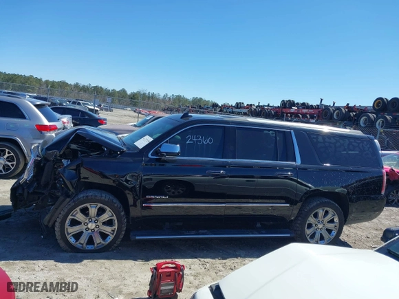 2016 GMC Yukon XL Denali with VIN 1GKS1HKJ5GR435925, listed as a IAAI auction lot 41727259 with 137,098 mi miles. Bid and sale history available at carsss.com. Image 14.