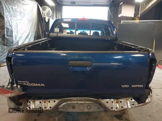 2014 Toyota Tacoma with VIN 3TMLU4EN4EM156933, listed as a IAAI auction lot 41197904 with 128,183 mi miles. Bid and sale history available at carsss.com. Image 6.