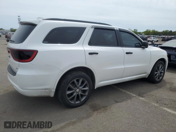 2018 Dodge Durango с VIN NY76958, выставлен на аукционе Copart как лот 55122245 с пробегом 102 413 миль миль и Списание • Salvage title. История ставок и продаж доступна на DreamBid. Изображение 3.