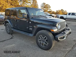 2024 Jeep Wrangler Sahara with VIN 1C4PJXENXRW118401, listed as a Copart auction lot 84731534 with 6,895 mi miles and Salvage Title. Bid and sale history available at DreamBid. Image 4.