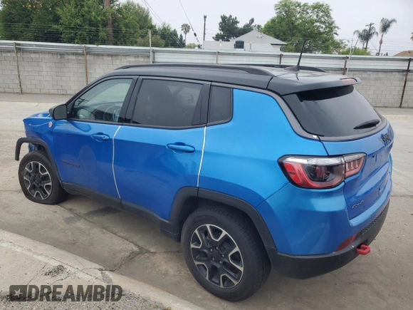 2021 Jeep Compass Trailhawk z VIN 3C4NJDDB9MT556516, wystawiony jako Copart lot #60338575 z przebiegiem 86 978 mil mil oraz Czysty tytuł • Clean title. Historia ofert i sprzedaży dostępna na DreamBid. Obrazek 2.