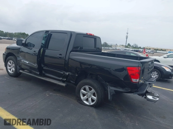 2014 Nissan Titan Pro-4X with VIN 1N6BA0EC1EN515685, listed as a IAAI auction lot 42423258 with 137,012 mi miles and . Bid and sale history available at DreamBid. Image 3.