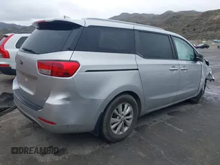 2016 Kia Sedona LX with VIN KNDMB5C13G6212492, listed as a IAAI auction lot 41793029 with 99,176 mi miles. Bid and sale history available at carsss.com. Image 4.