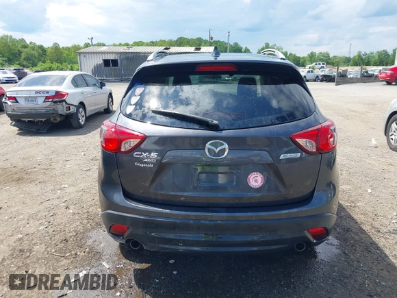 2015 Mazda CX-5 Touring with VIN JM3KE4CY9F0506879, listed as a IAAI auction lot 42209768 with 87,690 mi miles and . Bid and sale history available at DreamBid. Image 17.