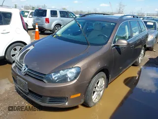 2011 Volkswagen Jetta SportWagen TDI with VIN 3VWPL7AJ2BM672287, listed as a IAAI auction lot 42013933 with 153,378 mi miles. Bid and sale history available at carsss.com. Image 2.