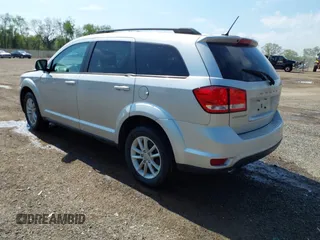 2013 Dodge Journey SXT z VIN 3C4PDCBG4DT564290, wystawiony jako IAAI lot #42225485 z przebiegiem 69 029 mil mil oraz . Historia ofert i sprzedaży dostępna na DreamBid. Obrazek 3.