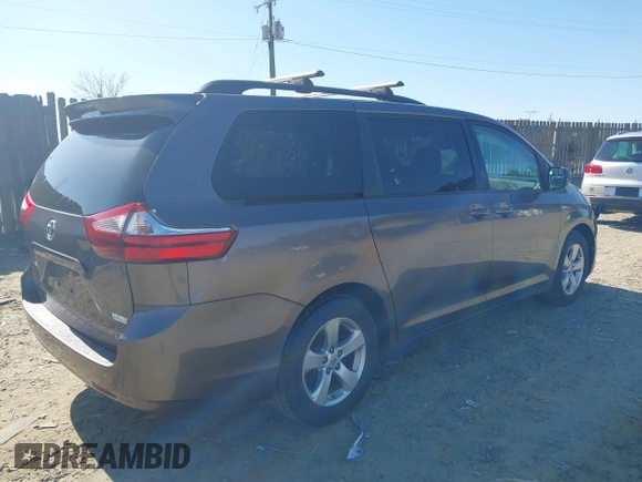 2016 Toyota Sienna LE AAS with VIN 5TDKK3DC3GS765784, listed as a IAAI auction lot 41759100 with 119,218 mi miles. Bid and sale history available at carsss.com. Image 4.