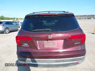 2017 Honda Pilot Touring with VIN 5FNYF5H96HB038413, listed as a IAAI auction lot 42594065 with 130,501 mi miles and . Bid and sale history available at DreamBid. Image 16.
