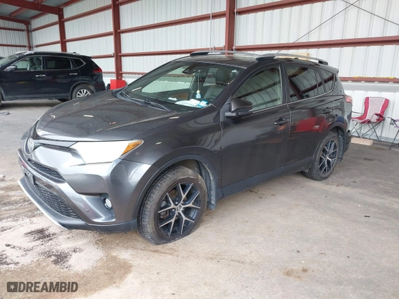 2016 Toyota RAV4 SE with VIN JTMJFREV7GJ072488, listed as a IAAI auction lot 42031254 with 106,901 mi miles. Bid and sale history available at carsss.com. Image 2.