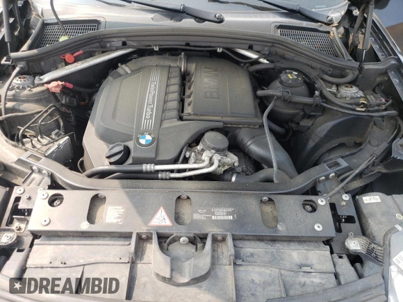 2015 BMW X4 xDrive35i with VIN 5UXXW5C59F0E87517, listed as a Copart auction lot 59604445 with 185,064 mi miles and Salvage title. Bid and sale history available at DreamBid. Image 11.