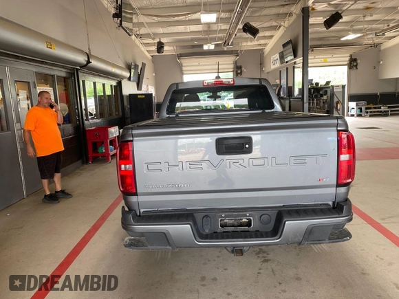 2021 Chevrolet Colorado 4WD Work Truck with VIN 1GCGTBEN0M1131662, listed as a IAAI auction lot 42788983 with 78,205 mi miles and . Bid and sale history available at DreamBid. Image 1.