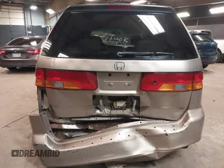 2004 Honda Odyssey LX with VIN 5FNRL18534B072936, listed as a IAAI auction lot 42366971 with 185,534 mi miles and . Bid and sale history available at DreamBid. Image 6.