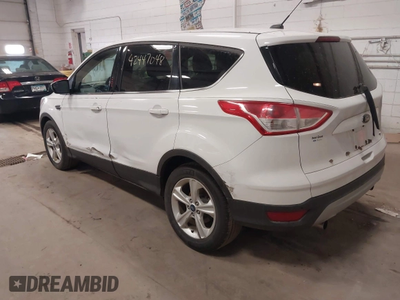 2013 Ford Escape SE with VIN 1FMCU0GX5DUA74237, listed as a IAAI auction lot 42447048 with 140,732 mi miles and . Bid and sale history available at DreamBid. Image 3.