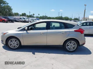 2017 Ford Focus Titanium с VIN 1FADP3N21HL327581, выставлен на аукционе IAAI как лот 42342179 с пробегом 61 489 миль миль и . История ставок и продаж доступна на DreamBid. Изображение 14.