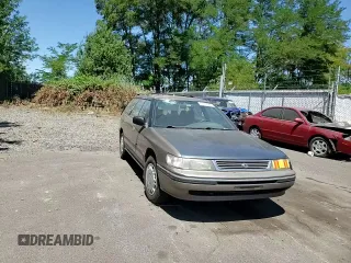 1993 Subaru Legacy L with VIN 4S3BJ6339P6948161, listed as a Copart auction lot 63123584 with 329,619 mi miles and Salvage Title. Bid and sale history available at DreamBid. Image 10.