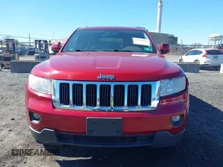 2012 Jeep Grand Cherokee Laredo with VIN 1C4RJFAG7CC297757, listed as a IAAI auction lot 41901645 with 270,731 mi miles. Bid and sale history available at carsss.com. Image 12.